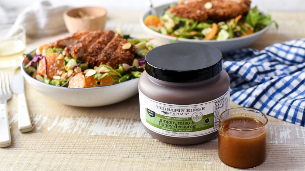 Crispy Sesame Chicken Salad Featuring Ginger, Miso & Honey Dressing Crispy Sesame Chicken Salad Featuring Ginger, Miso & Honey Dressing